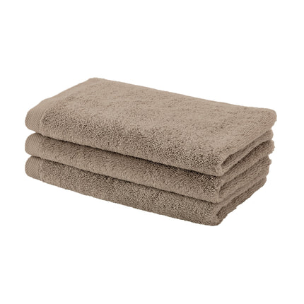 Stapel gastendoekjes in zacht bruine kleur Aquanova London gastendoekjes set in kleur Bronze